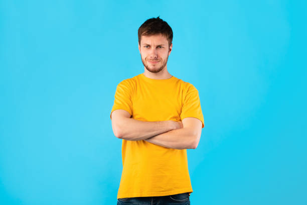 istock Portrait of man standing with folded arms 1287826818