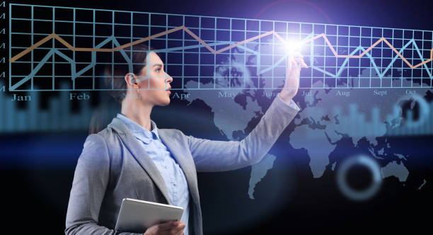 istock Creative Collage With Businesswoman Touching Virtual Screen With Digital Business Data Graph 1287828639