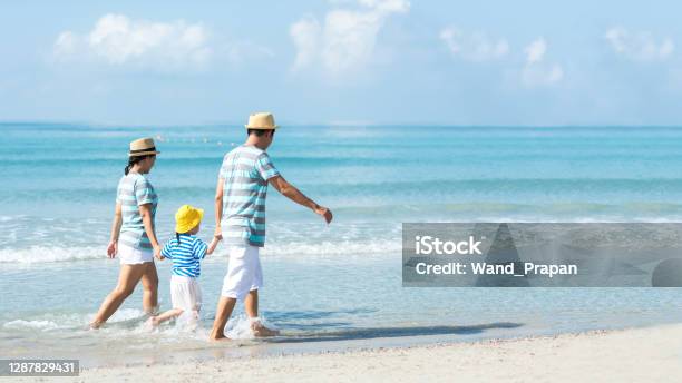 Happy Family Summer Sea Beach Vacation Asia Young people Lifestyle Travel Enjoy Fun And Relax Leisure Destination In Holiday Travel And Family Concept Stock Photo - Download Image Now