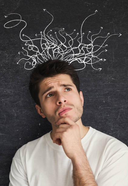 istock Pensive young businessman thinking over different ways of company development, collage 1287829900