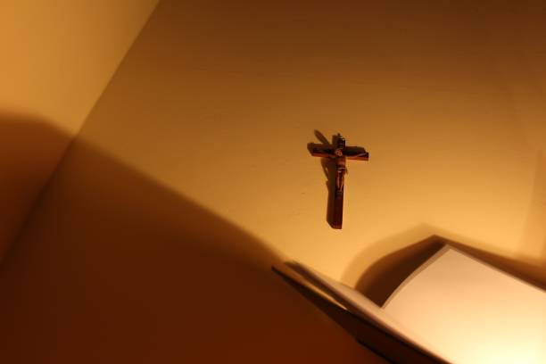 istock Crucifix shadow darkness Catholic religion 1287830052