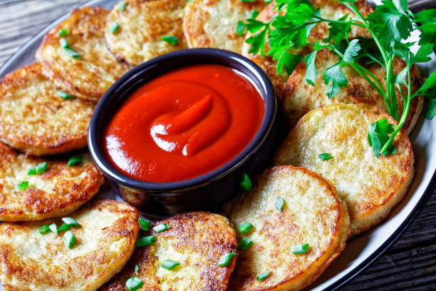 istock Potato pancakes with cottage cheese with garlic, parsley 1287833833