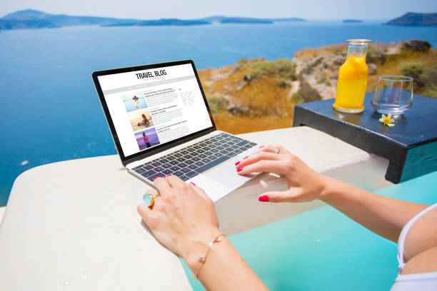 istock Blogger writing blogs about her travels 1287835513