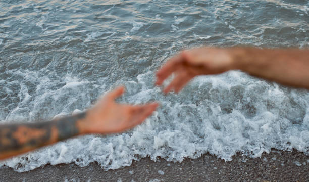 istock Couple on the beach. 1287840293