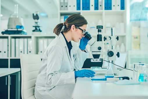 Shot of a scientist using a microscope in a laboratory