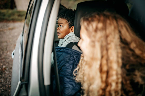 istock Kids driving in car 1287849450