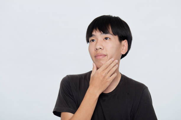 istock portrait of a young Asian man making a confident 1287849556