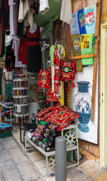 the el wad hagai street souvenir shop with products for tourists is located on street a in the old city of jerusalem, in israel - ha gai imagens e fotografias de stock