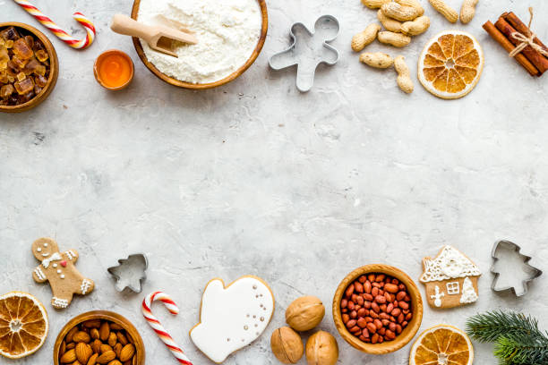 istock Frame of Chtistmas cooking - icing gingerbread cookies, top view 1287856882