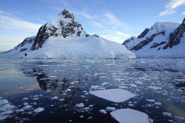 istock During the Antarctic summer, many pieces of melted broken ice float on the sea. 1287862970