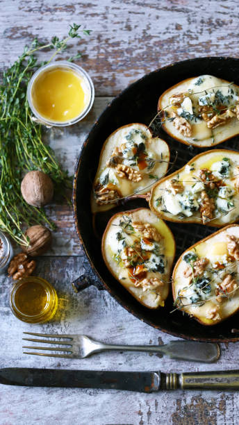 istock Baked pears with dorblu cheese and herbs. 1287870086