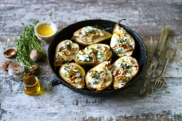 istock Baked pears with dorblu cheese and herbs. 1287870092