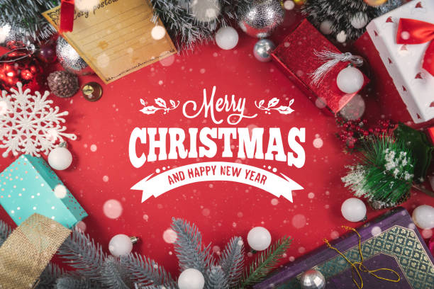 istock Christmas concept, composition on a red background, frame of decorations, wish for a happy new year, snow on background 1287870333