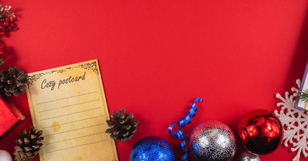 istock New year banner border from attributes and postcard bottom frame, top view, red background 1287870517