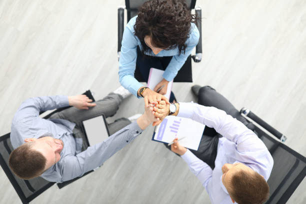 istock People sit in the office and negotiate a contract 1287872781