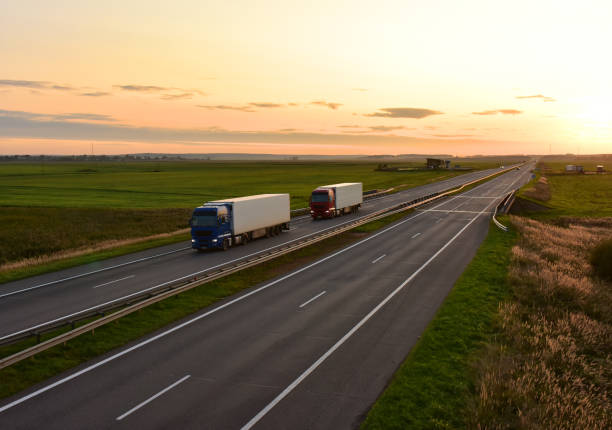 istock Truck with semi-trailer driving along highway 1287874093