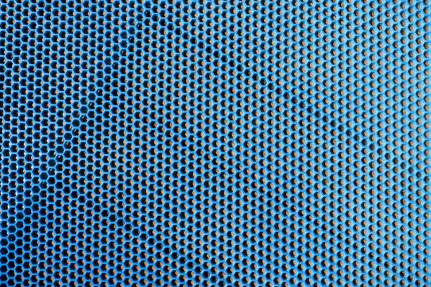 Blue honeycomb material on floor background. Swimming pool mats concept