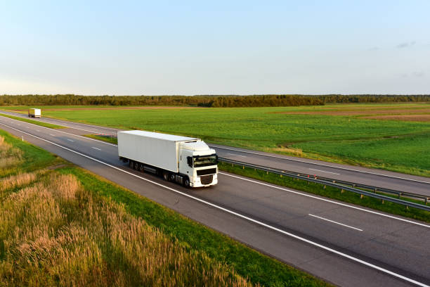 istock Truck with semi-trailer driving along highway 1287874656