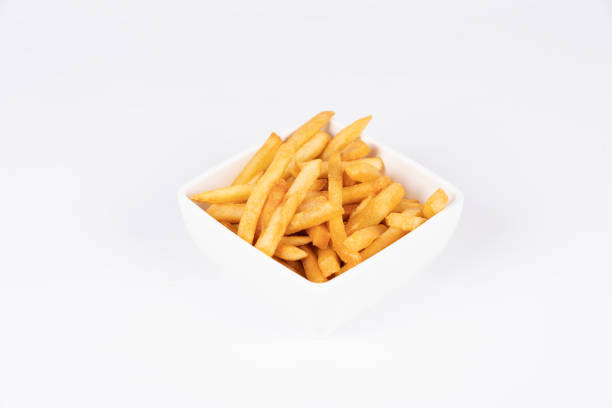 istock french fries isolated on white, studio shot 1287874752