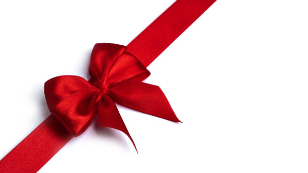 istock Red bow and ribbon on a white background 1287880567