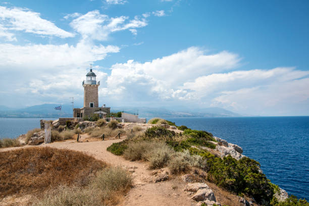 istock shooting at the top of a cliff on a lighthouse 1287888242