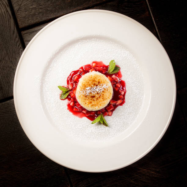 istock cheesecake garnished with strawberry jam 1287890582