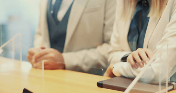 istock Crossed arms in business 1287891554