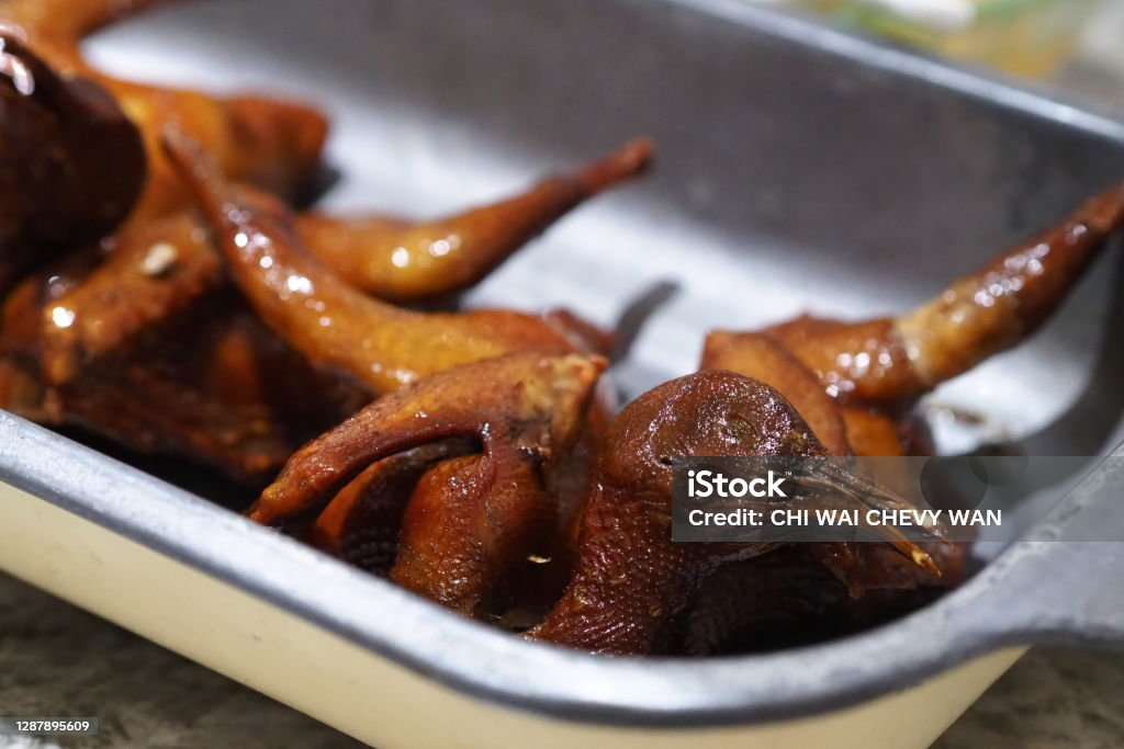 Chinese fried pigeon Chinese fried pigeon , Hong Kong Squab - Pigeon Meat Stock Photo