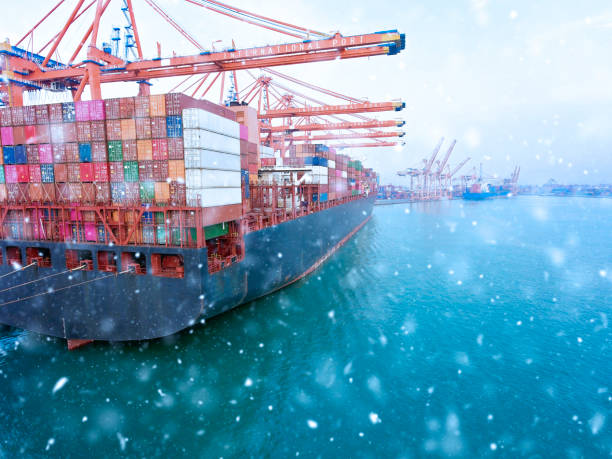 istock Industrial Container yard for Logistic Import Export business in winter. 1287896831