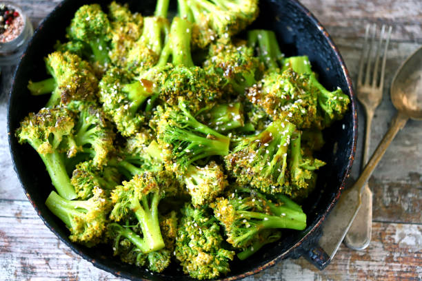 istock Baked broccoli in a pan with sesame seeds. 1287899072