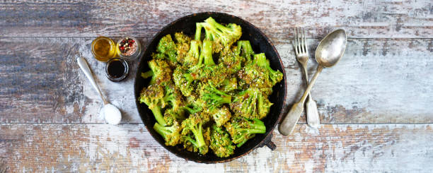 istock Baked broccoli in a pan with sesame seeds. 1287899080