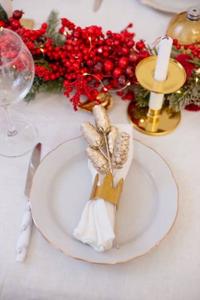 istock Details of the decorated Christmas white table 1287899181