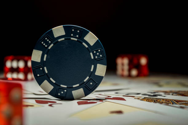 istock Poker chip, playing cards and dices with, selective focus 1287899402
