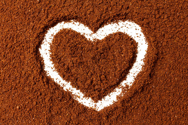 istock Painted heart on the surface of ground coffee 1287899931