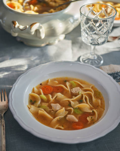 istock Chicken Noodles Soup with Fresh Vegetables 1287907283