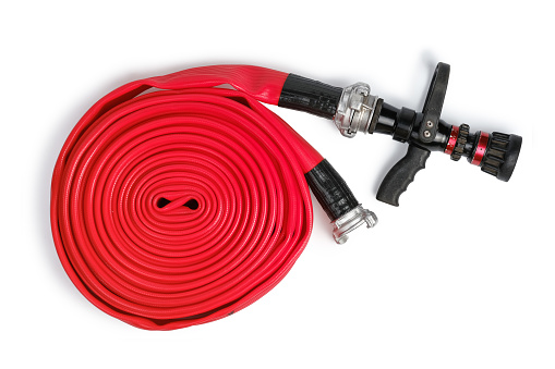 Red rolled firefighter hose isolated on the white background. Flat Lay, top view