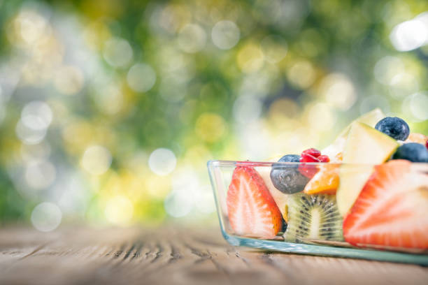 istock Portion fruit salad in a bowl . Healthy meal 1287908497
