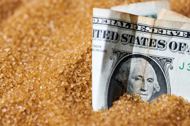 istock Dollar money in sugar 1287910626