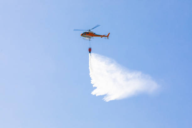 istock Fire helicopter in front of blue sky 1287910738
