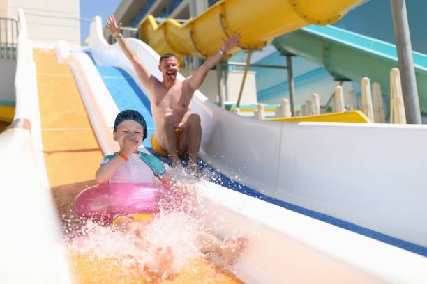 istock Family spend time at aquapark. 1287911060