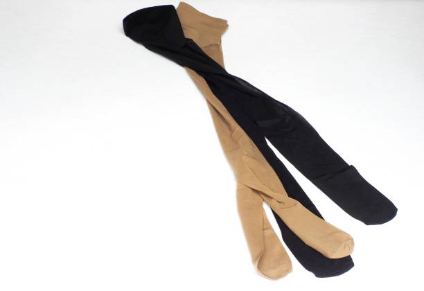 istock Tights pantyhose beige and black color 1287912842
