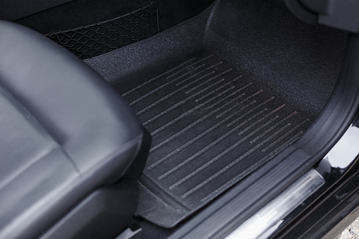 Car inside, passenger foot mat