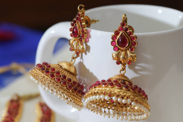 istock various gold jewelry accessories 1287916799