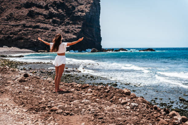 reconnection to nature – outdoor meditation and digital detox - image alternative energy canary islands color image imagens e fotografias de stock