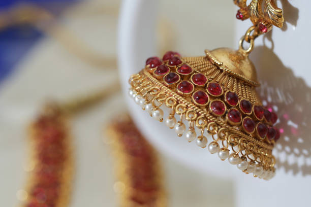 istock various gold jewelry accessories 1287917897