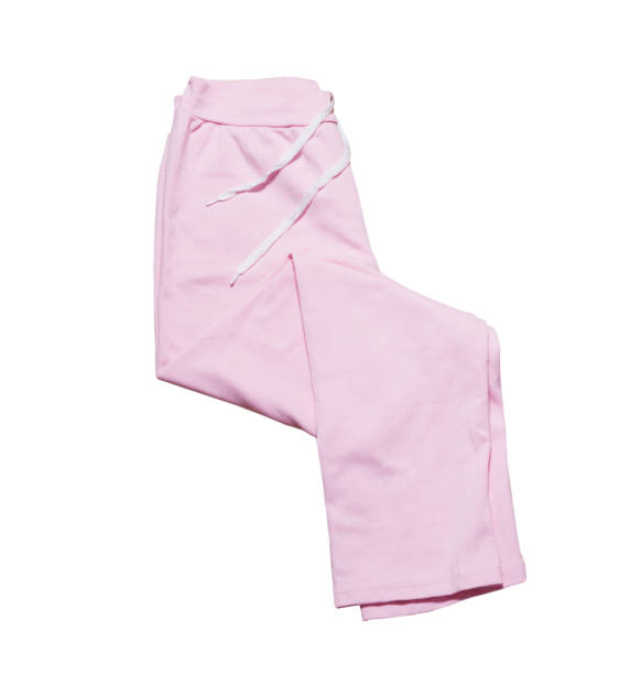 istock Folded pink sport pants close up isolated 1287919098