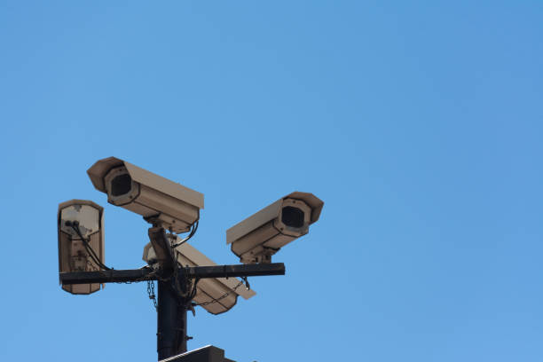 istock Four security cameras on the street 1287920335