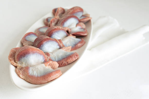 istock Raw chicken stomach, turkey offal. uncooked guts of poultry. Isolate. Copy space 1287921326