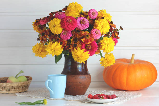 istock bouquet of garden flowers, pumpkin and raspberry. 1287925834