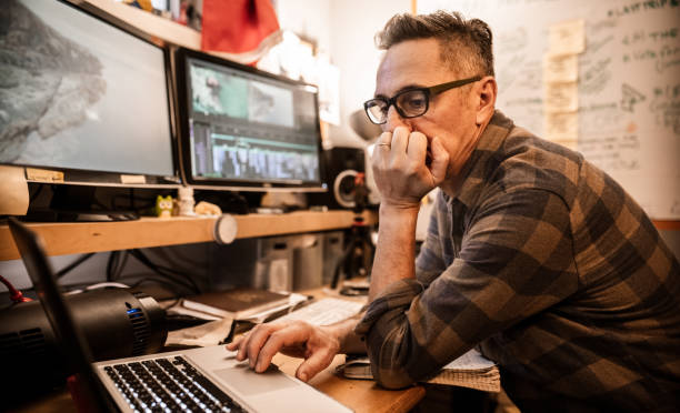 Male video editor working at home